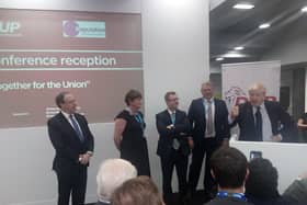 Jeffrey Donaldson, with party colleagues, listening to Boris Johnson at a DUP drinks reception at the Conservative Party conference in October 2019.