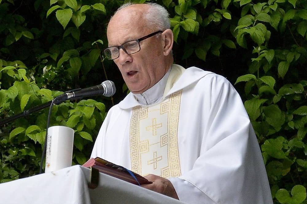 2018: The late Fr Aidan Mullan, Adm. Long Tower  Church, pictured at an  Open Air Mass to celebrate the Feast of the Visitation of the Blessed Virgin Mary, held at the Brandywell Grottot.  DER2218G035