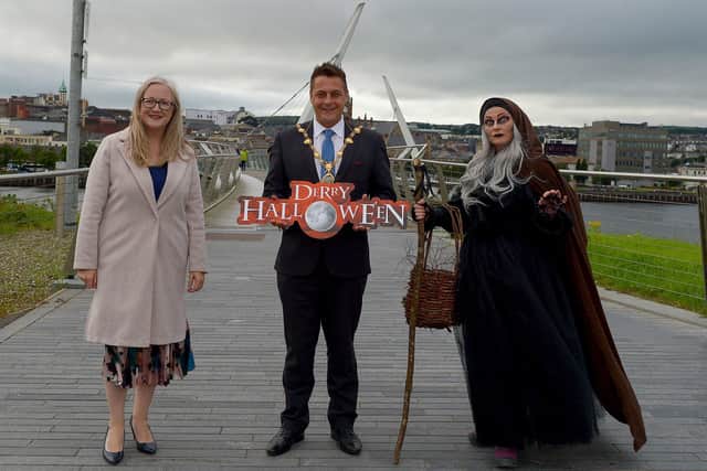 Áine Kearney, Director of Business Support and Events at Tourism NI, the Cailleach and Mayor Alderman Graham Warke pictured yesterday afternoon at the launch of DCSDC’s programme for Halloween 2021. DER2137GS – 026