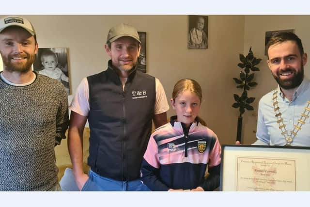 Tank and Skinny's Edward and Shane also presented Rachel with a voucher.