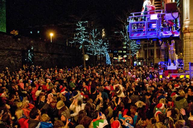 A section of the crowd from a previous Christmas Lights Switch On in Derry. This year Santa will lead a procession through the streets with the trail of lights coming on in his wake. (Picture Martin McKeown Inpresspics.com)