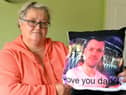 Mrs Ruth Bone at her home in Shearwater Way with a picture of her son Dale who died from substance abuse earlier this year. Photo: George Sweeney.  DER2137GS – 030
