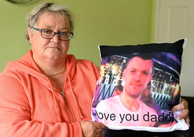Mrs Ruth Bone at her home in Shearwater Way with a picture of her son Dale who died from substance abuse earlier this year. Photo: George Sweeney.  DER2137GS – 030