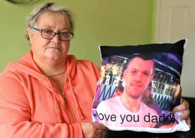 Mrs Ruth Bone at her home in Shearwater Way with a picture of her son Dale who died from substance abuse earlier this year. Photo: George Sweeney. DER2137GS – 030