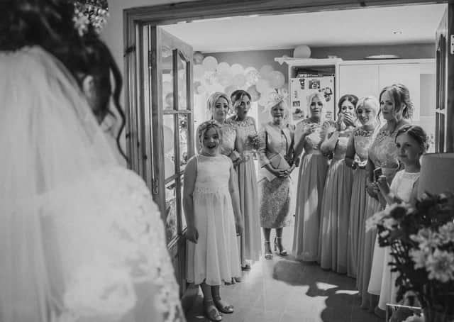 The wedding of Jason and Hannah. (jamesaikenphotography.com)
