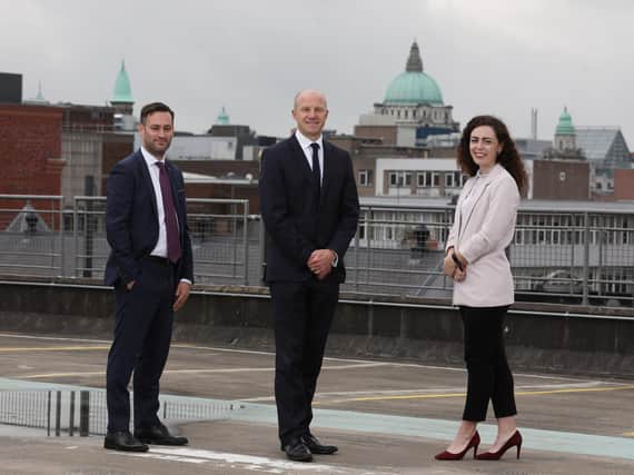 Kevin Hegarty (left), new director of healthcare at Tughans with managing partner Patrick Brown and newly qualified solicitor Aoife Murray.