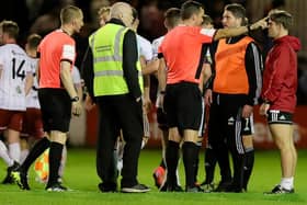 Derry City boss Ruaidhri Higgins challenges referee Rob Harvey’s decision to add three extra minutes of injury time after the 3-3 draw with Bohs at Dalymount. Photographs by Kevin Moore.