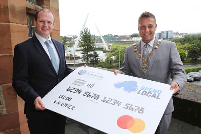 Economy Minister Gordon Lyons with the Mayor of Derry and Strabane, Alderman Graham Warke. Registration for the High Street Scheme Spend Local card will be open from  September 27 until October 25.