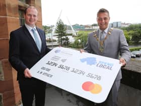 Economy Minister Gordon Lyons with the Mayor of Derry and Strabane, Alderman Graham Warke. Registration for the High Street Scheme Spend Local card will be open from  September 27 until October 25.