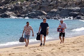 Gordon Ramsay Gino D'Acampo and Fred Sirieix taste test the Mykonos sausage at a Barbecue on Paradise Beach