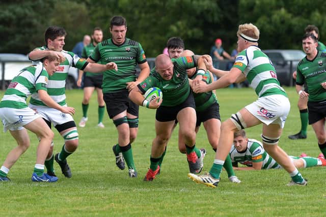 City of Derry's Tiernan Thornton make a break against Omagh at Judges Road on Saturday. Photo: George Sweeney