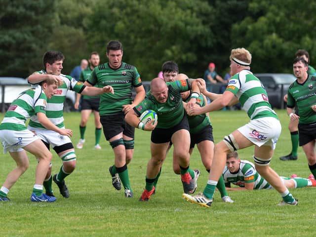 City of Derry's Tiernan Thornton make a break against Omagh at Judges Road on Saturday. Photo: George Sweeney