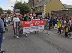 Paddy Diver, his family and campaigners pictured at the start of a protest in Lifford recently.