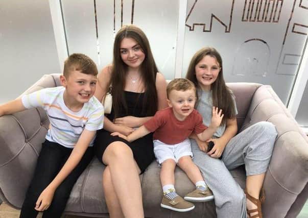Jake Harkin with his sisters 16-year-old Abbie, 10-year-old Kacey and nine-year-old Rory.