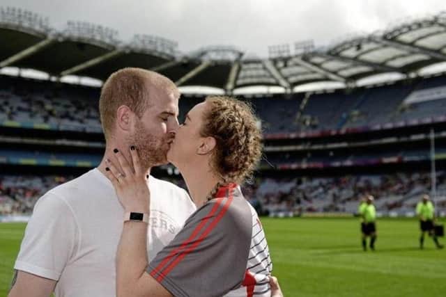 Derry's Ciara McGurk kisses her boyfriend Ryan McCloskey after he proposed to her following the 2017 TG4 Ladies Football All-Ireland Junior Championship Final against Fermanagh at Croke Park in Dublin. (Photo by Cody Glenn/Sportsfile )