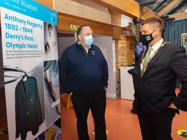 Mayor, Alderman Graham Warke, talking to Paul Hegarty whose great uncle Anthony Hegarty (silver medal 8000 metres cross country, Olympic Games,1920), was Derry's first Olympic hero, at the launch of a temporary exhibition entitled 'Sports of Our Time' at the Tower Museum.