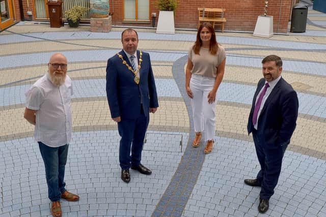 2020: Robin Swann MLA, Minister of Health, on the right, pictured with Joe Thompson, Project Co-ordinator CCIS, then Mayor Colr. Brian Tierney , and Sharon Hill, Project Manager CCIS, during a visit to Extern. DER2025GS - 011