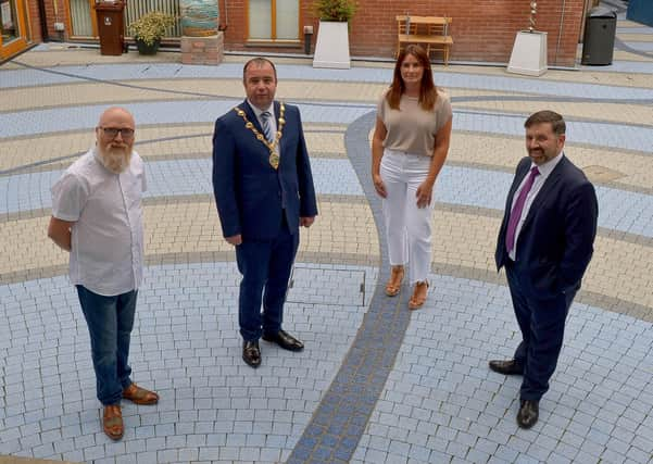 2020: Robin Swann MLA, Minister of Health, on the right, pictured with Joe Thompson, Project Co-ordinator CCIS, then Mayor Colr. Brian Tierney , and Sharon Hill, Project Manager CCIS, during a visit to Extern. DER2025GS - 011