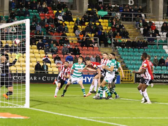 Danny Lafferty puts Derry City ahead against Shamrock Rovers with a superb header. Photograph by Kevin Moore.