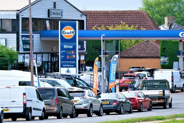 Cars queue for petrol in Cambridgeshire