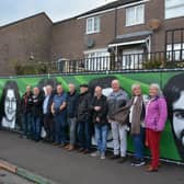 Some of those in attendance at the unveiling of a new political mural commemorating the 22 republicans who died on hunger strike between 1917 and 1981.
