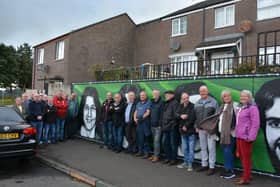 Some of those in attendance at the unveiling of a new political mural commemorating the 22 republicans who died on hunger strike between 1917 and 1981.