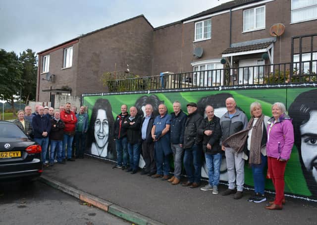 Some of those in attendance at the unveiling of a new political mural commemorating the 22 republicans who died on hunger strike between 1917 and 1981.