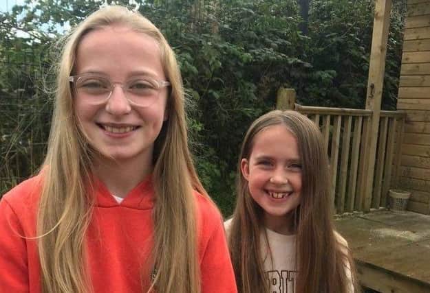 Aoife and Cara Morris who are donating their hair to the Little Princess Trust.