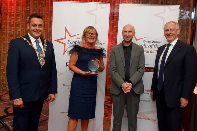 Lifetime Achievement Award winner Phil Coulter represented by his daughter Siobhan pictured with the Mayor of Derry and Strabane Alderman Graham Warke, Brendan McDaid, Editor of the Derry Journal and Paul McLean from Principal Sponsor BetMcLean . Photo: George Sweeney.  DER2139GS – 062