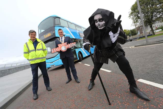 The wicked Walter deBurgh joins Mayor of Derry City and Strabane District, Alderman Graham Warke, and Tony McDaid, Translink Service Delivery Manager for the announcement of the Translink Halloween Shuttle Service.