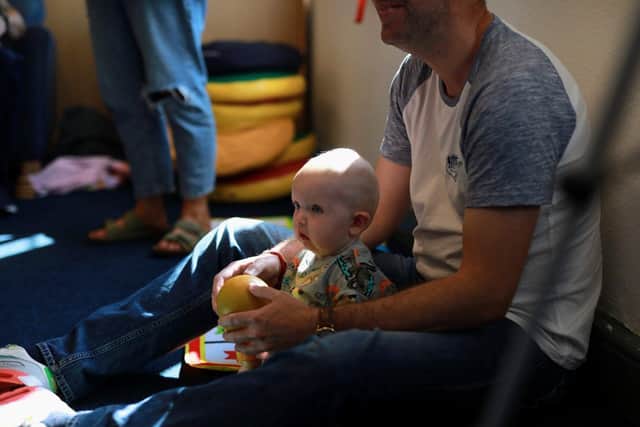 Finn, nine months, enjoyed listening to the Baby Shark bagpipe rendition.