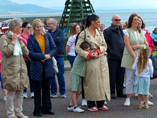 Some of the attendance at the Annual Blessing of the Greencastle fishing fleet, in the village, on Friday afternoon last. Photo: George Sweeney. DER2231GS – 065