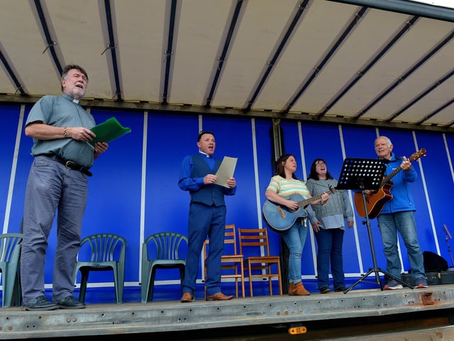 The Annual Blessing of the Greencastle fishing fleet service underway in the village, on Friday afternoon last. Photo: George Sweeney.  DER2231GS – 060