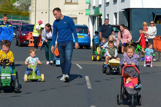 The Pedal Powered Tractor Run and Doll Push underway at the Greencastle Regatta on Friday afternoon last. Photo: George Sweeney. DER2231GS – 071