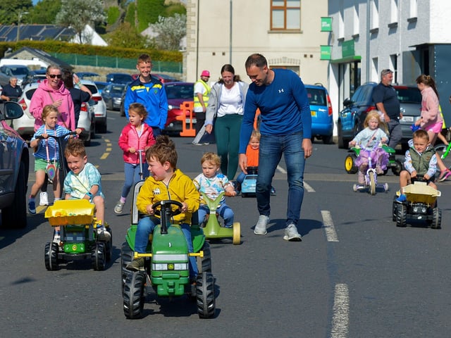 The Pedal Powered Tractor Run and Doll Push underway at the Greencastle Regatta on Friday afternoon last. Photo: George Sweeney. DER2231GS – 072