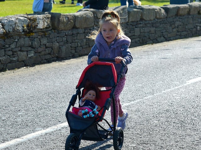 The finish line within sight at the Pedal Powered Tractor Run and Doll Push race held during the Greencastle Regatta on Friday afternoon last. Photo: George Sweeney. DER2231GS – 073