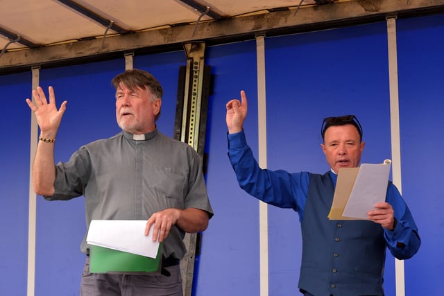 Fr Patrick O’Hagan PP, Moville, and the Rev Alan McCracken, COI, Moville blessing the Greencastle fishing fleet at the annual service on Friday afternoon last. Photo: George Sweeney.  DER2231GS – 064