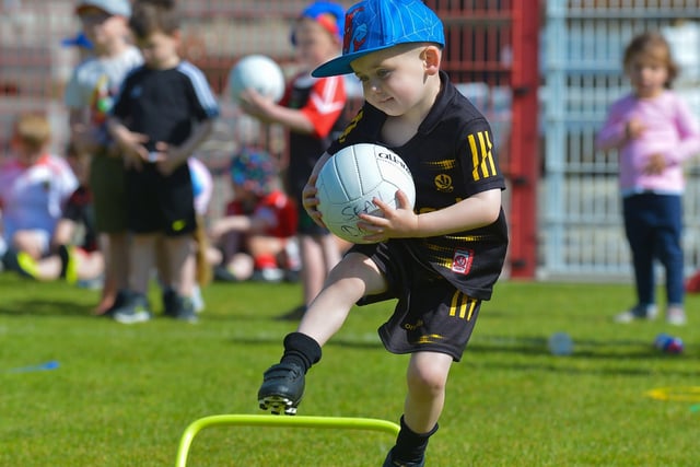 Young footballer on the obstacle course at the Sean Dolan’s Cul Camp on Tuesday last. Photo: George Sweeney.  DER2232GS – 009