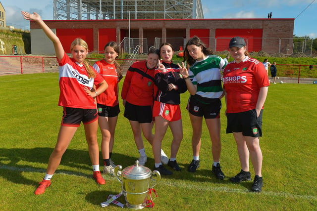 Girls from the Under 15 team pose with the Anglo Celt Cup at the Sean Dolan’s Cul Camp on Tuesday last. Photo: George Sweeney.  DER2232GS – 006