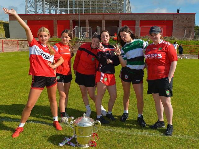 Girls from the Under 15 team pose with the Anglo Celt Cup at the Sean Dolan’s Cul Camp on Tuesday last. Photo: George Sweeney. DER2232GS – 006