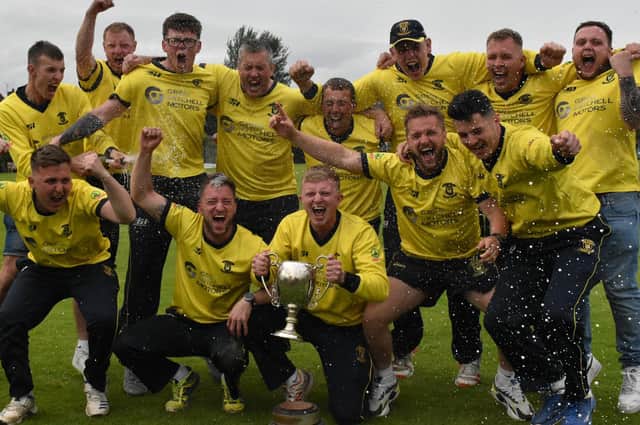 It's champagne time for the successful Fox Lodge team after their defeat of Newbuildings secured the club it's first ever North West Senior Cup win at Eglinton on Saturday. (Photo: Lawrence Moore)