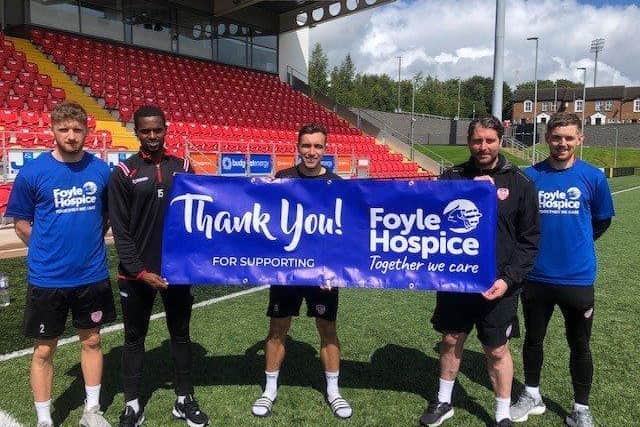 Derry City FC manager Ruaidhri Higgins and players Joe Thomson, Ronan Boyce, Sadou Diallo and Jamie McGonigle show their support for next month’s Foyle Hospice male walk-run.