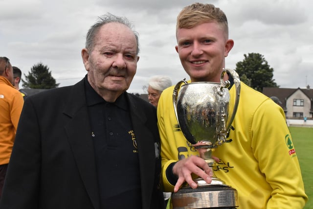 Fox Lodge captain Aaron Heywood celebrates the historic win with his grandfather and club stalwart, Jackie Heywood after they defeated Newbuildings. (Photo: Lawrence Moore)
