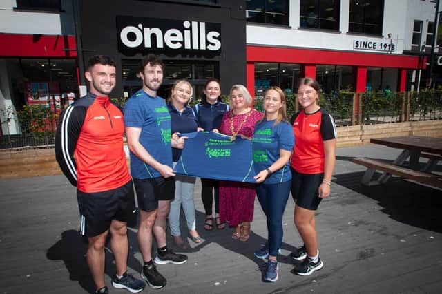 Mayor of Derry City and Strabane District Council, Colr. Sandra Duffy launching the 2022 'Jog in the Bog'  at O'Neills Sports Superstore on Wednesday. The event will take place on Thursday, 18th August this year. Included from left are Charlie White, O'Neill's, Ironman Danny Quigley, Aileen McGuinness, Director, Bogside Brandywell Health Forum, Aisling Hutton, event organiser, BBHF, Caroline Casey, manager, O'Neill's Sports Superstore, and Ellie Gallagher, O'Neills. (Photos: Jim McCafferty Photography)