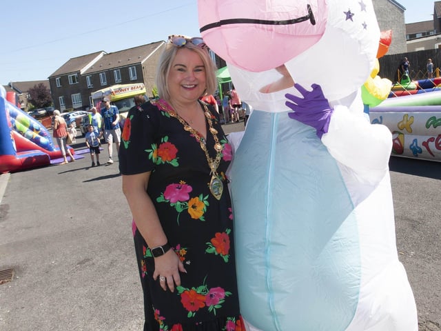 Mayor Sandra Duffy with one of the many colourful characters on display at Thursday's event.
