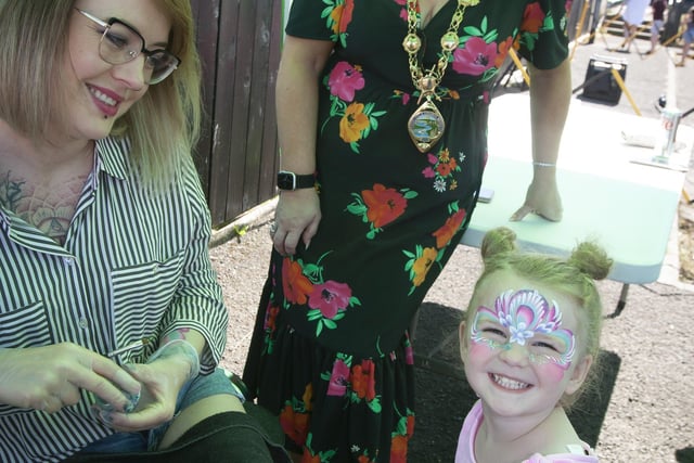 A big smile from three years-old Myla Bradley for the Mayor, Sandra Duffy at the Leafair Summer Fun Day on Thursday afternoon. On right is Anna of 'Anna's Cheeky Faces' Face Painting.