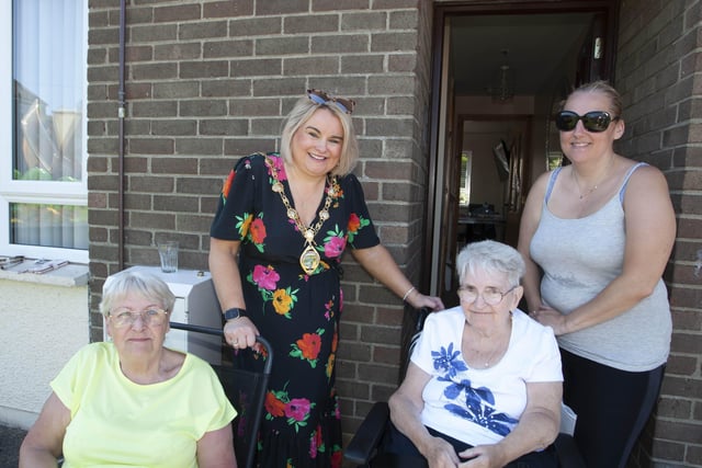 Mayor Sandra Duffy takes time out for a chat with Leafair residents Eileen McLaughlin, Rosemary and Ann-Marie McCallion on Thursday.