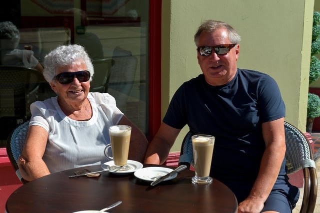 Kieran Barrett and his mum Nula relax during Derry’s mini heatwave yesterday afternoon.  Photo: George Sweeney.  DER2232GS – 021