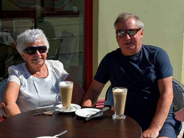 Kieran Barrett and his mum Nula relax during Derry’s mini heatwave yesterday afternoon.  Photo: George Sweeney.  DER2232GS – 021
