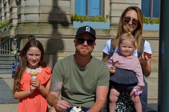 Frieda, Adrian, Mia and Etta Snorn enjoy ice-cream during and warm temperatures in Derry yesterday afternoon.  Photo: George Sweeney.  DER2232GS – 020